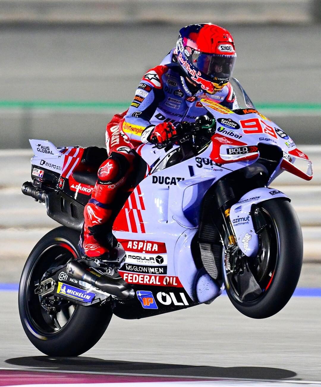 MOTO-TRON supported Ducati race motorcycle competing on circuit