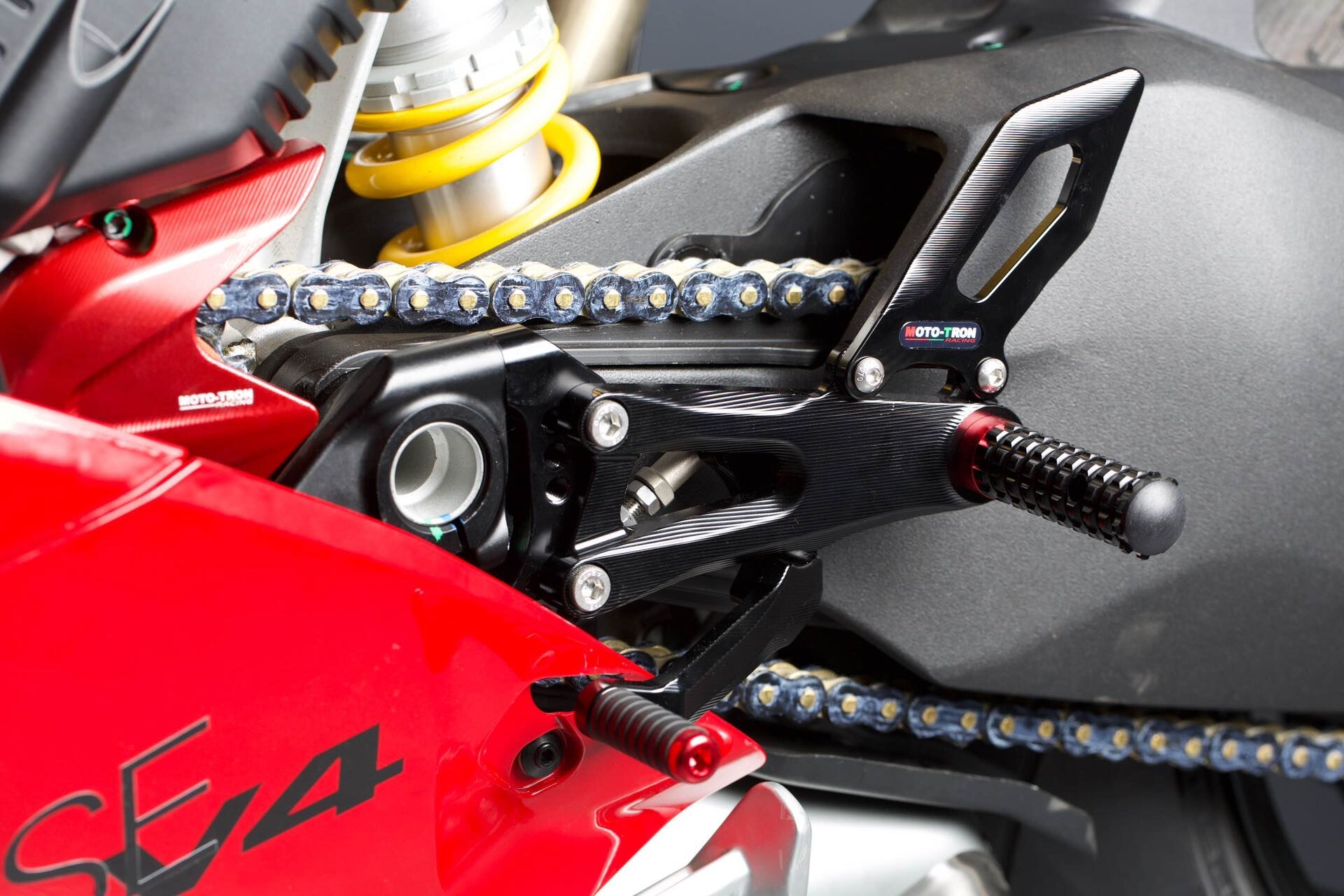 MOTO-TRON rear set installed on a Ducati performance motorcycle